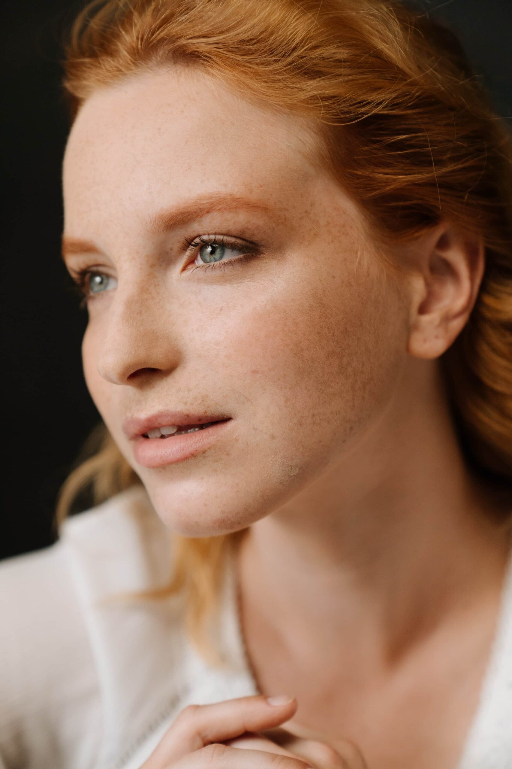 hyperpigmentation sun damage woman looking off to side the eyewearhouse